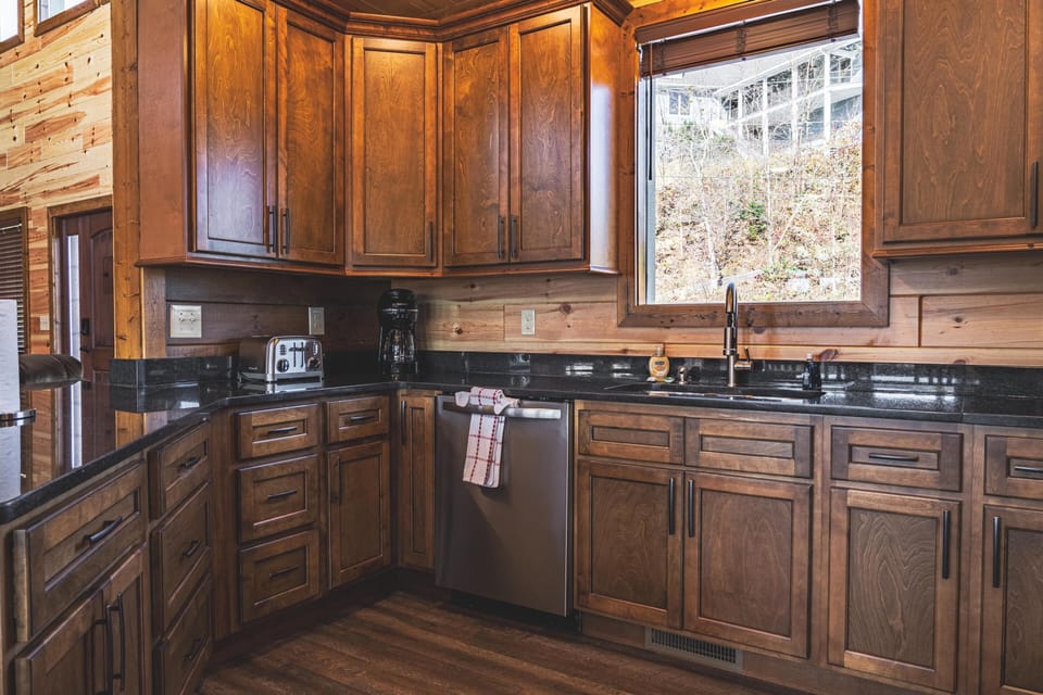 Fully equipped kitchen with stainless steel appliances. 