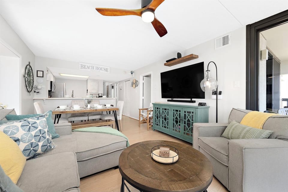 enjoy the open floor plan from the kitchen to dining area and living room