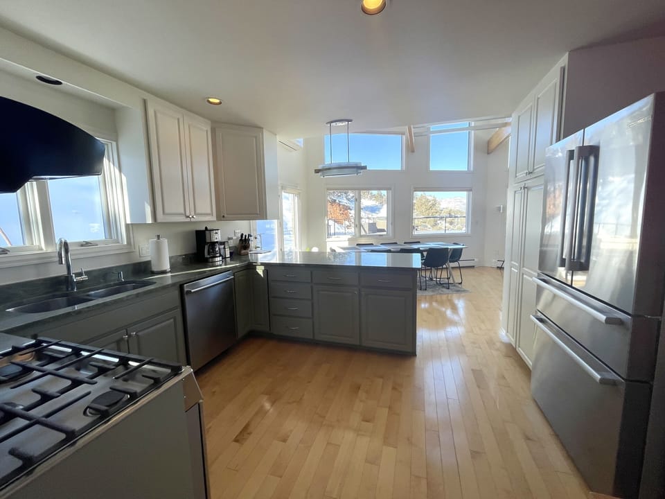 Kitchen with all the need items for any cook with a nice view of the mountains