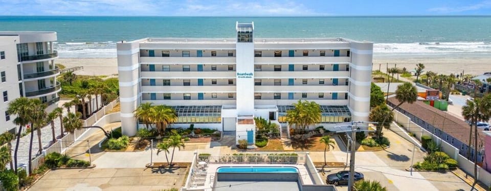 Aerial view of Boardwalk with a Complex pool and private beach access for guests to use!