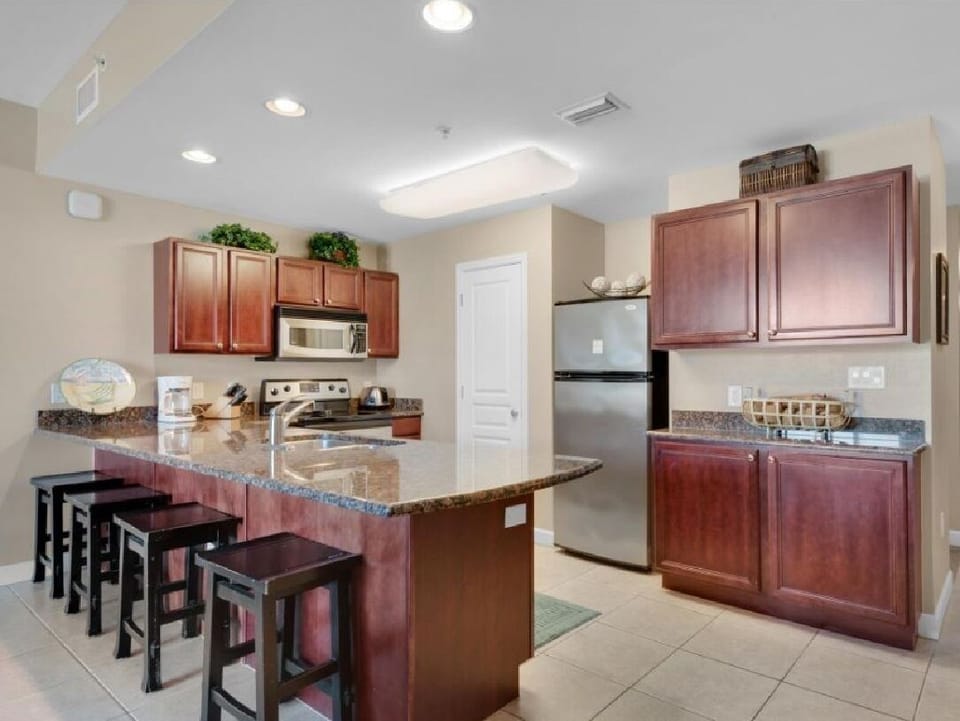 Kitchen with Bar Seating and Pantry