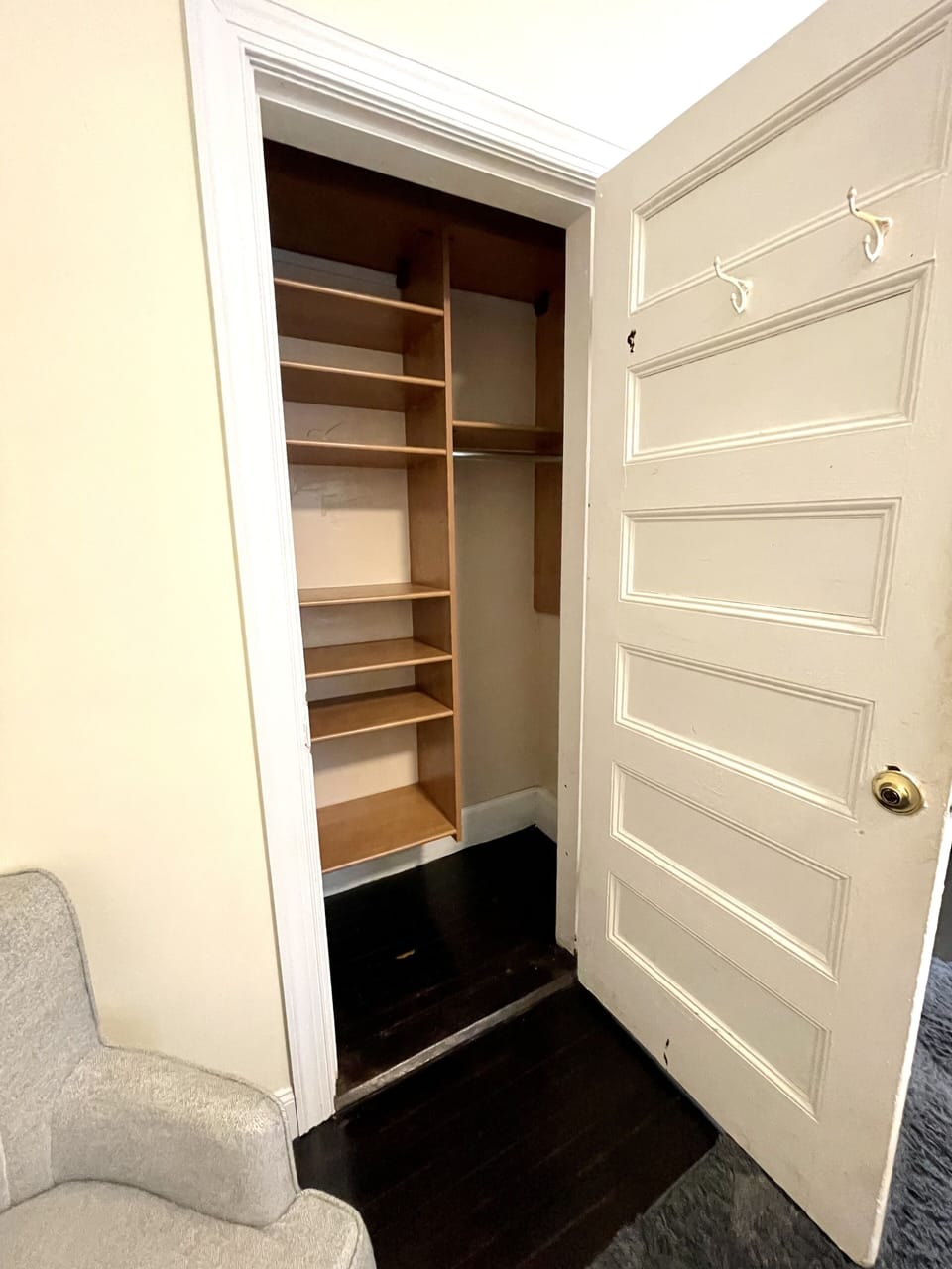 Large closet space with plentiful shelving and rod to hang clothes 