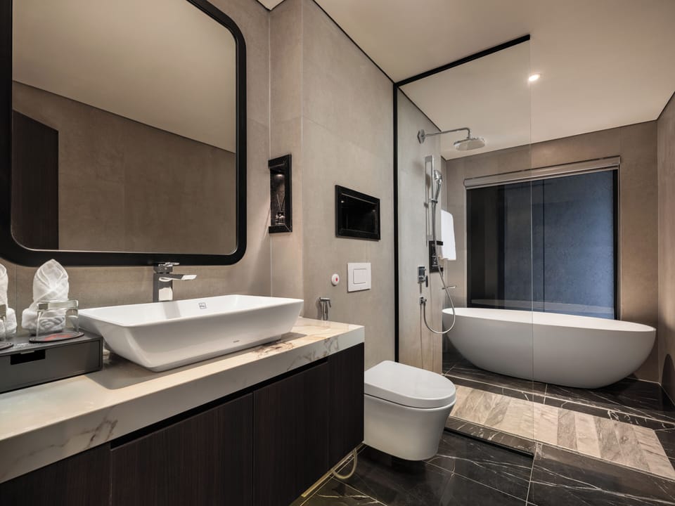 Junior Double Suite, Balcony | Bathroom | Shower, hydromassage showerhead, free toiletries, hair dryer