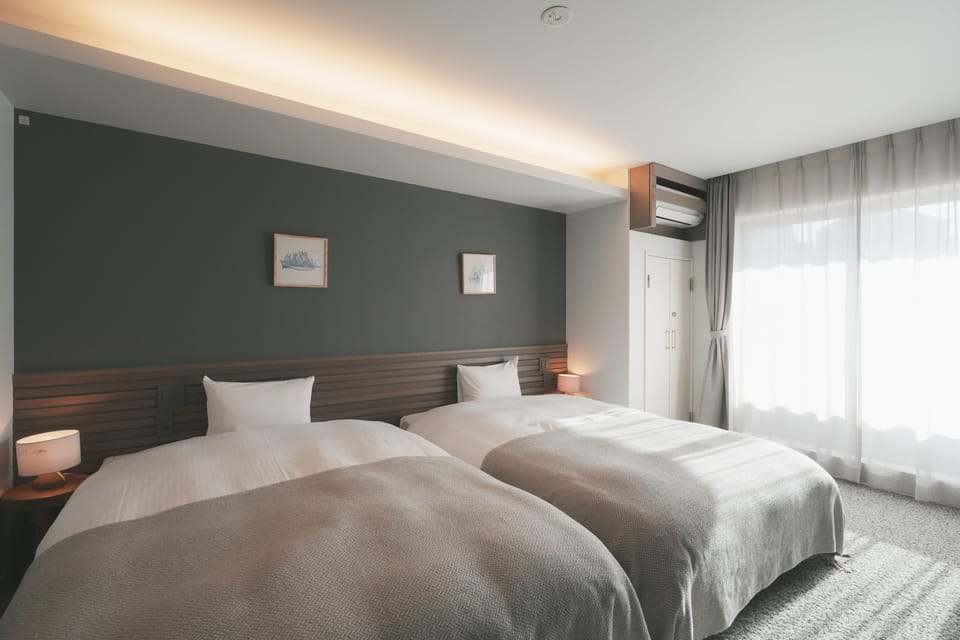 Executive Twin Room | Premium bedding, down comforters, individually decorated
