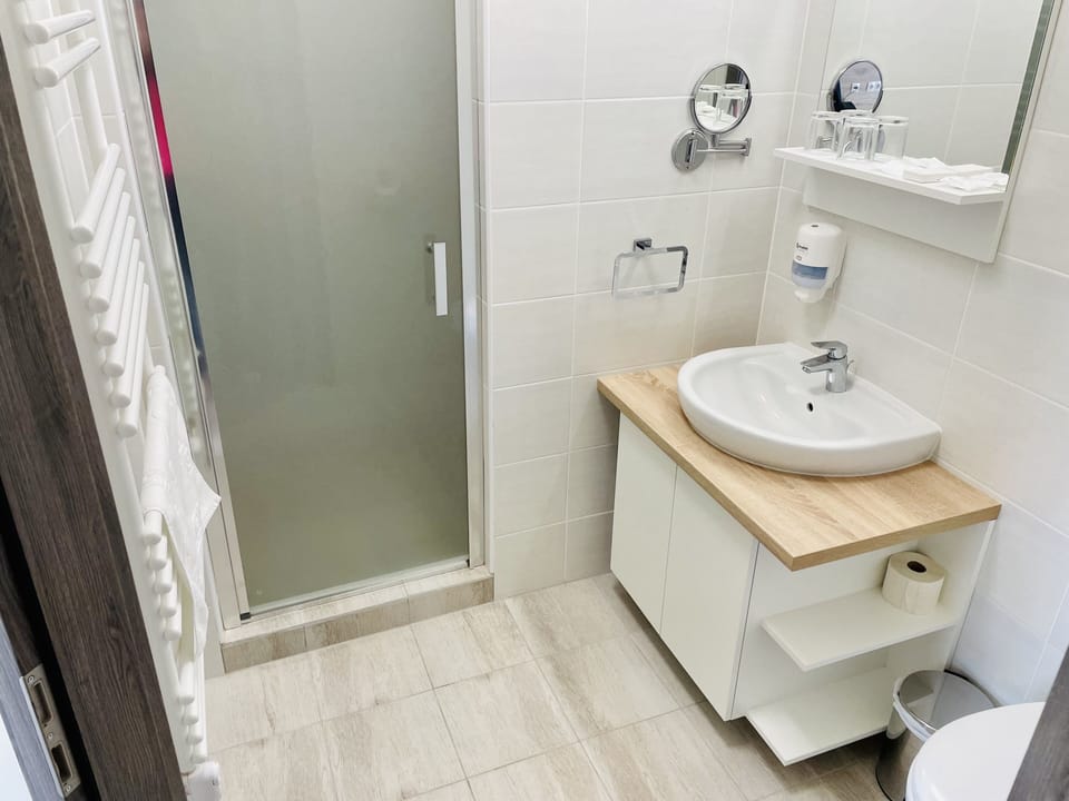 Standard Double or Twin Room | In-room safe, desk, laptop workspace, blackout drapes
