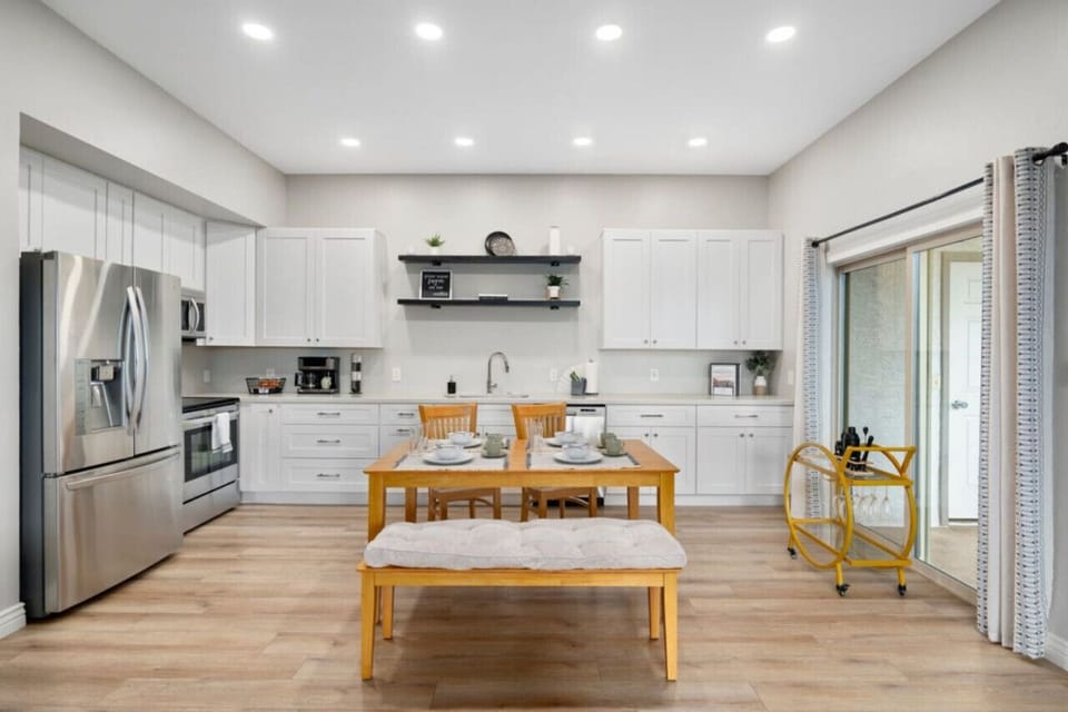 Open kitchen with dining for 4 in a bright, spacious layout.