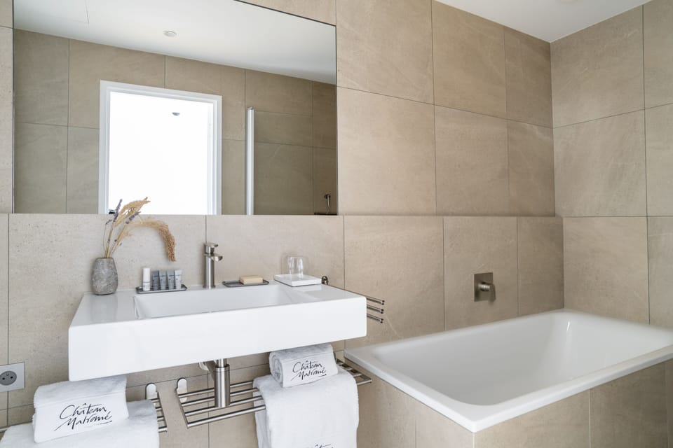 Exclusive Double Room | Bathroom | Designer toiletries, hair dryer, bathrobes, slippers