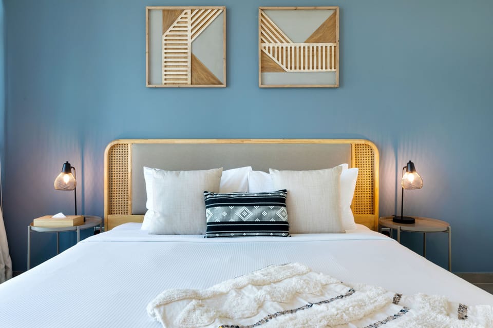 Apartment, 1 Bedroom, City View | 1 bedroom, in-room safe, blackout drapes, iron/ironing board