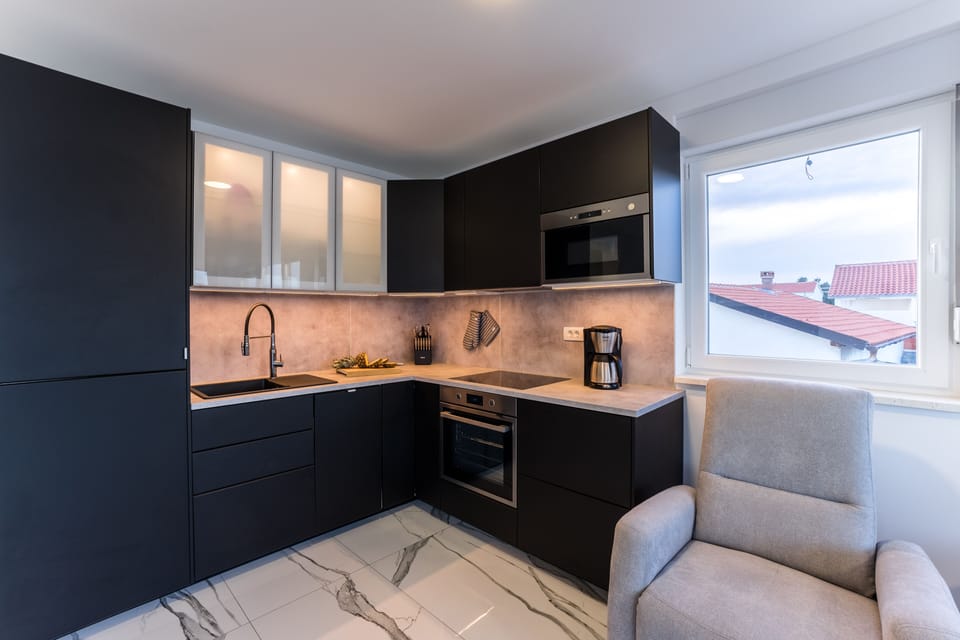 Family Apartment A1 | Private kitchen | Fridge, microwave, oven, stovetop
