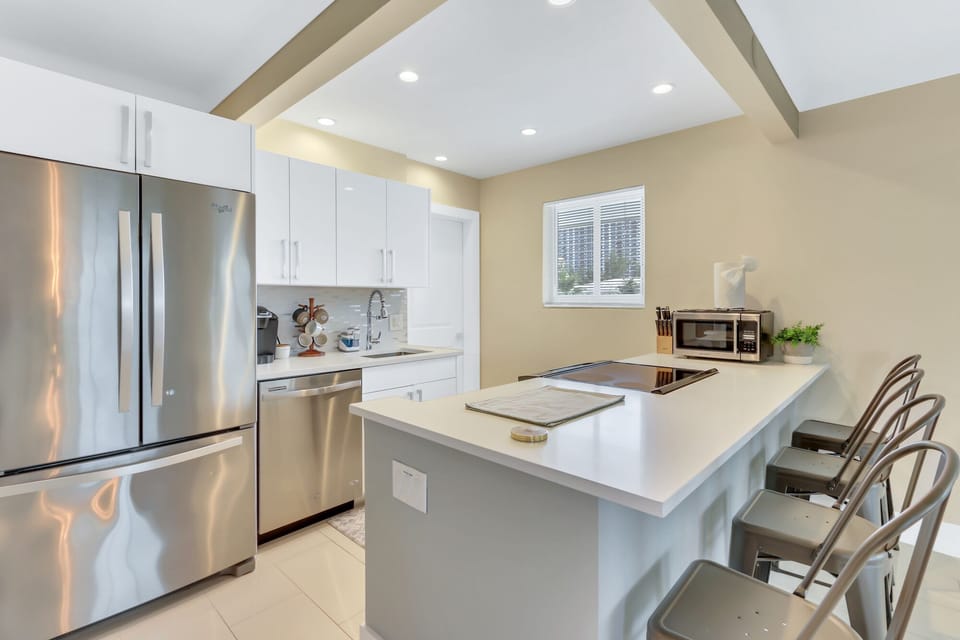 Kitchen equipped w/ top-of-the-line appliances.