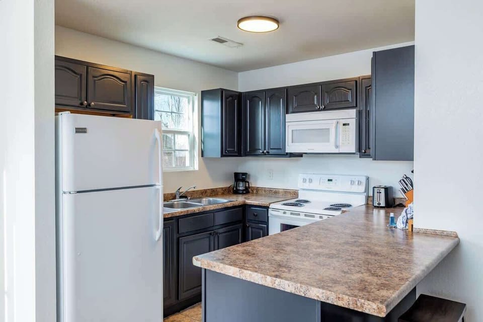 This fully equipped kitchen is a chef's dream come true! With all the essentials in place, it's the perfect space to unleash your culinary creativity and make every meal a special occasion.