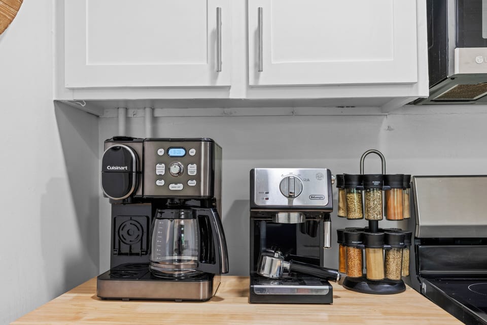 Coffee bar includes starter coffee, pods, sugars, creamers, tea, and filters.