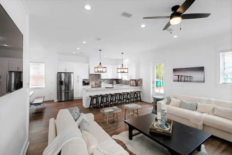 The open kitchen concept allows the family chef join in on the conversation