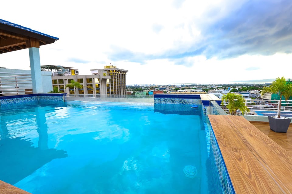 Clean and beautiful Pool. 24 hr access on top of roof.  Over looking city. 