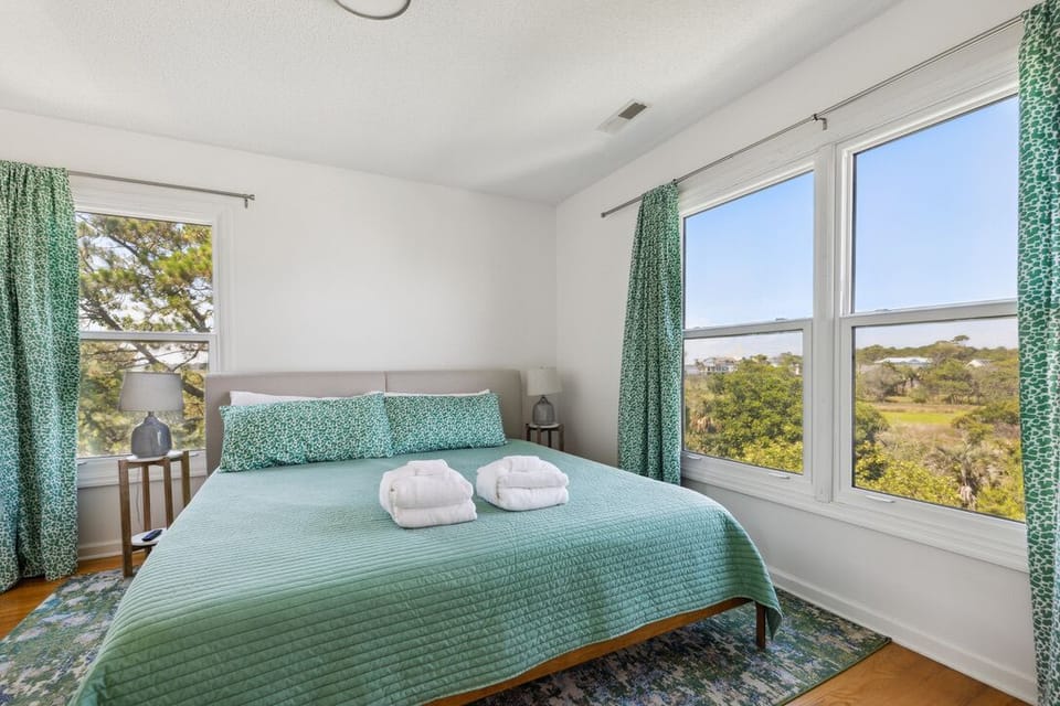 First bedroom with King Bed and views of Ravenel Bridge and Ocean Views.