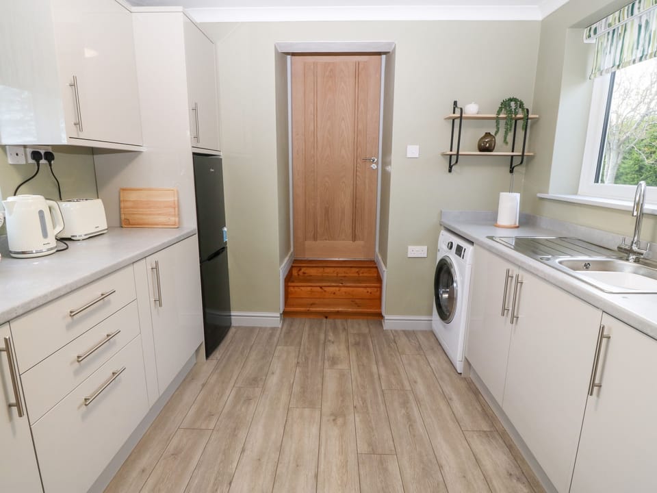 Fridge, electric kettle, toaster, cookware/dishes/utensils