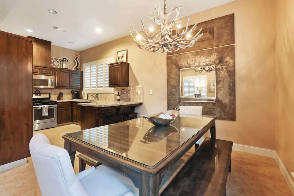 Enjoy your meals in this warm and elegant kitchen and dining area.