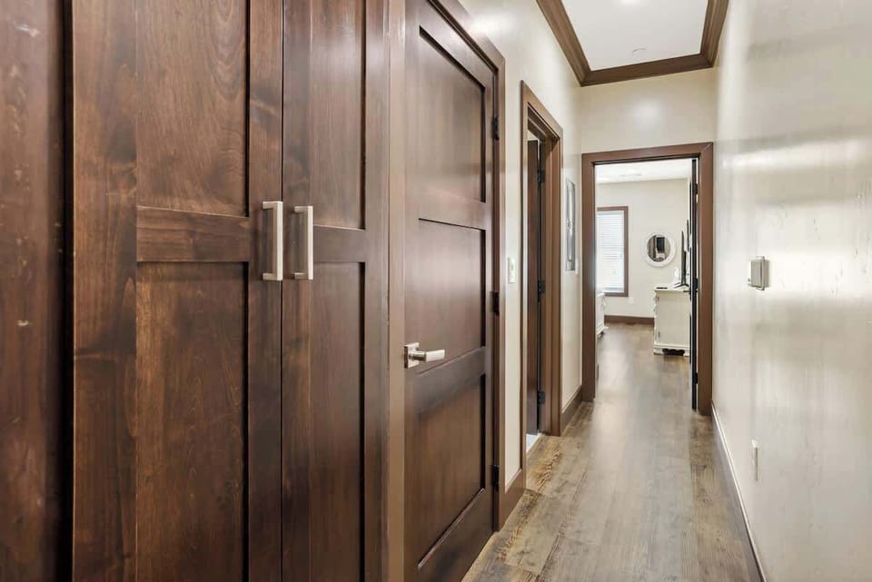 Hallway leading to the restroom and bedroom.