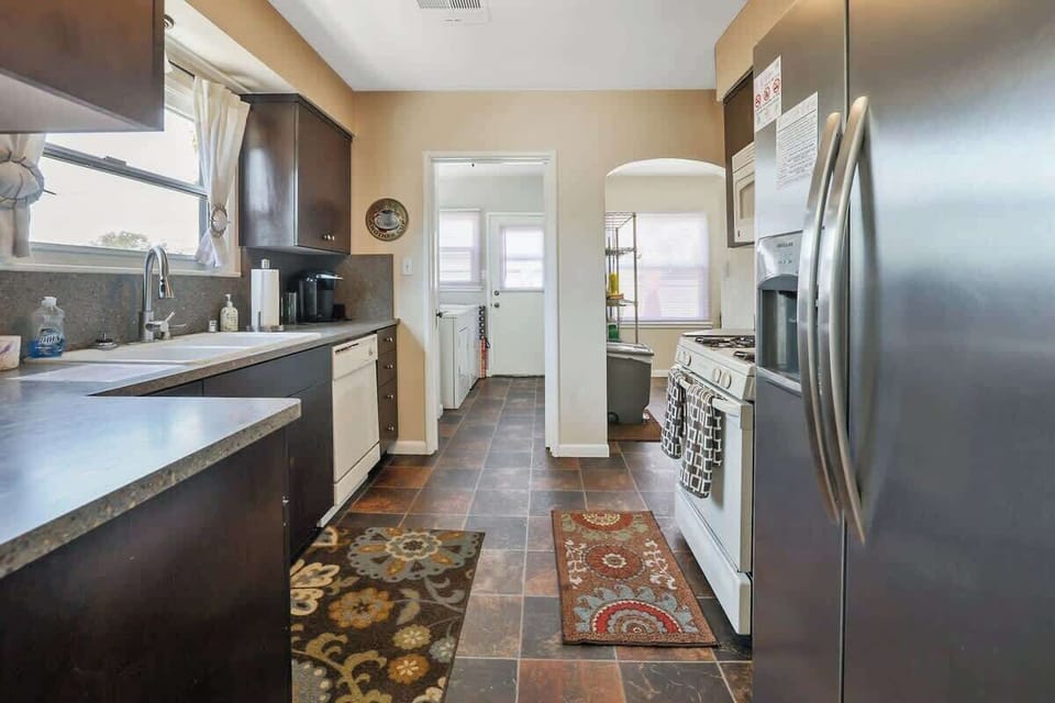 Toaster, dishwasher, and microwave in the kitchen. 