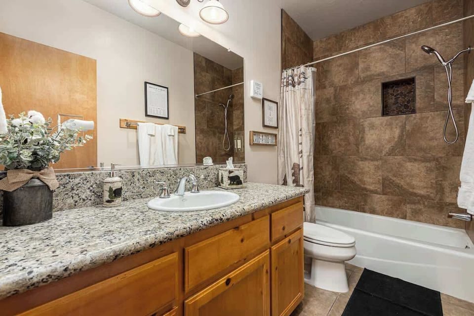 Downstairs bathroom with a shower and bathtub!