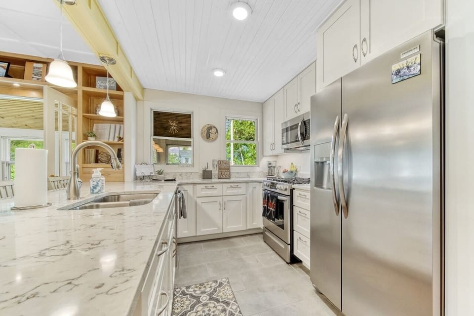 Fully stocked kitchen with gas stove
