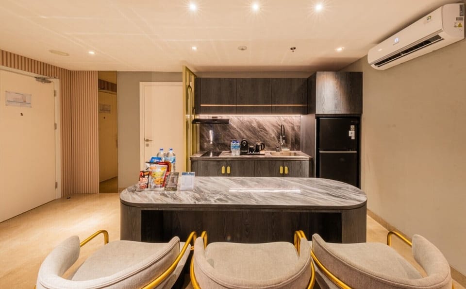 Royal Suite | Living room | 55-inch Smart TV with digital channels, Netflix, streaming services