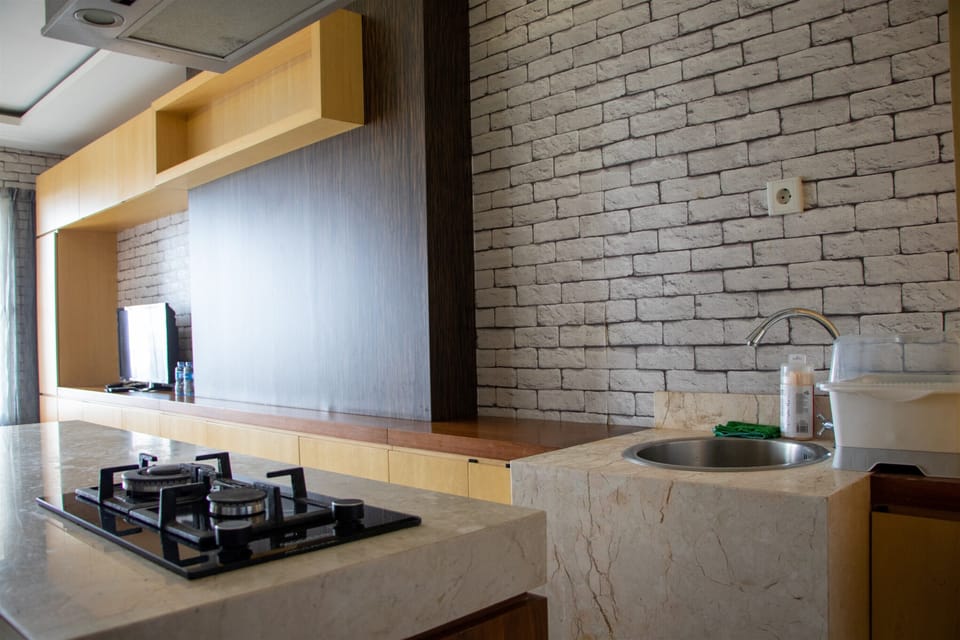 Apartment, 2 Bedrooms | Private kitchen | Fridge, stovetop, cookware/dishes/utensils, dining tables