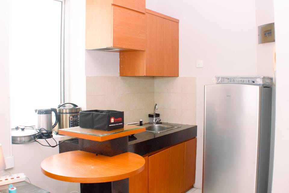 Studio | Private kitchen | Fridge, stovetop, cookware/dishes/utensils, dining tables