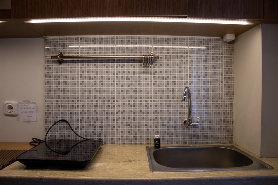 Apartment, 1 Bedroom | Private kitchen | Fridge, stovetop, cookware/dishes/utensils, dining tables