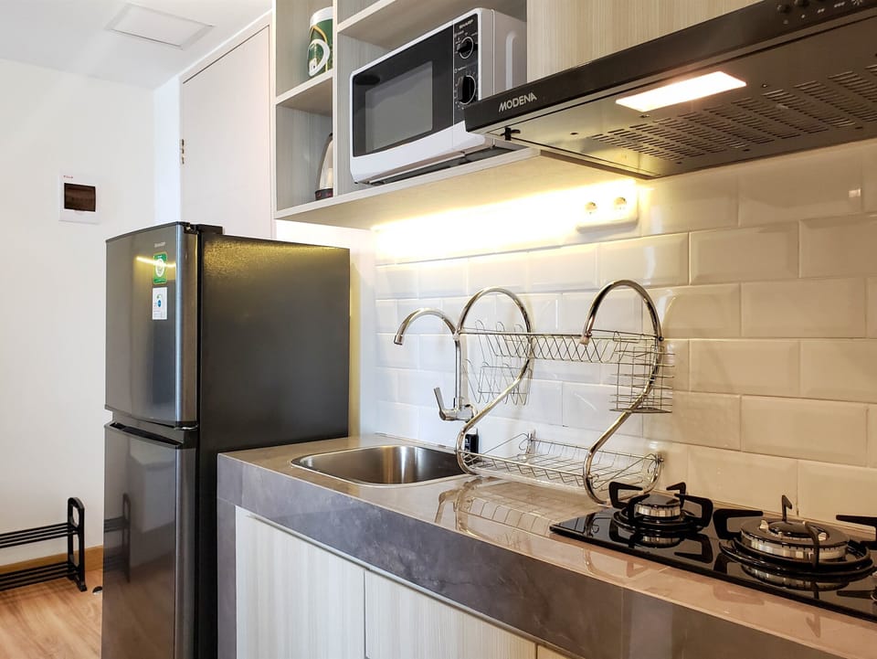 Apartment, 2 Bedrooms | Private kitchen | Fridge, stovetop, cookware/dishes/utensils, dining table