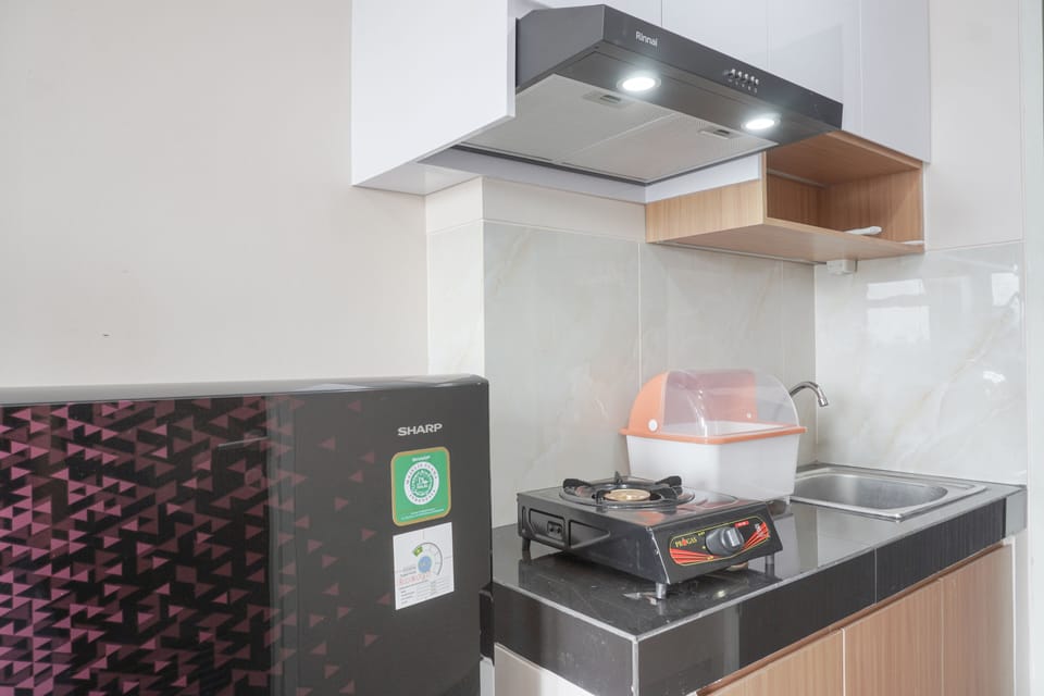 Studio | Private kitchen | Fridge, stovetop, cookware/dishes/utensils, dining tables