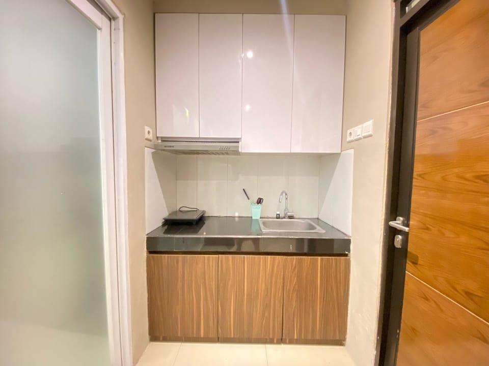 Apartment, 1 Bedroom | Private kitchen | Fridge, stovetop, cookware/dishes/utensils, dining tables