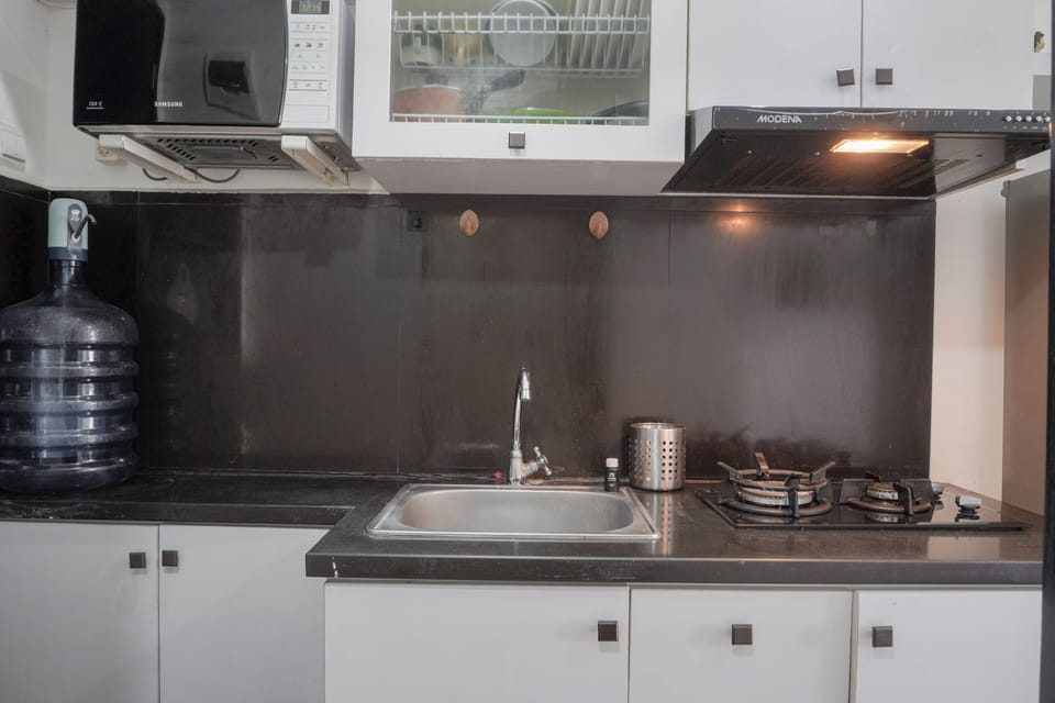 Studio | Private kitchen | Fridge, stovetop, cookware/dishes/utensils, dining tables