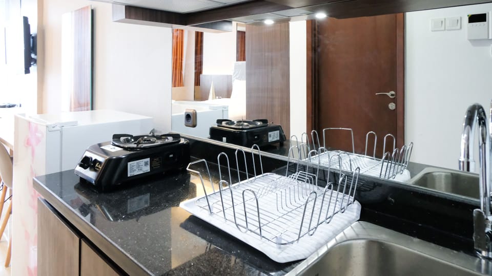 Studio | Private kitchen | Fridge, stovetop, cookware/dishes/utensils, dining tables