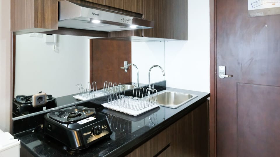 Studio | Private kitchen | Fridge, stovetop, cookware/dishes/utensils, dining tables