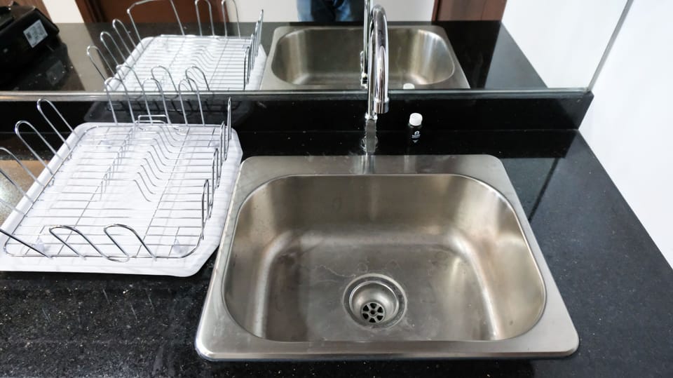 Studio | Private kitchen | Fridge, stovetop, cookware/dishes/utensils, dining tables