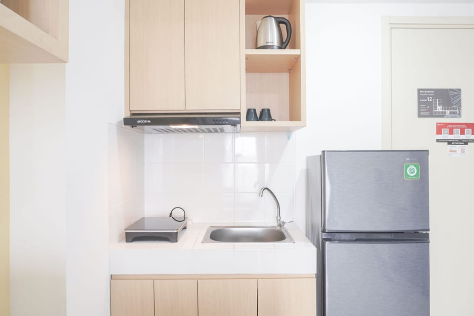 Apartment, 2 Bedrooms | Private kitchen | Fridge, stovetop, cookware/dishes/utensils, dining tables