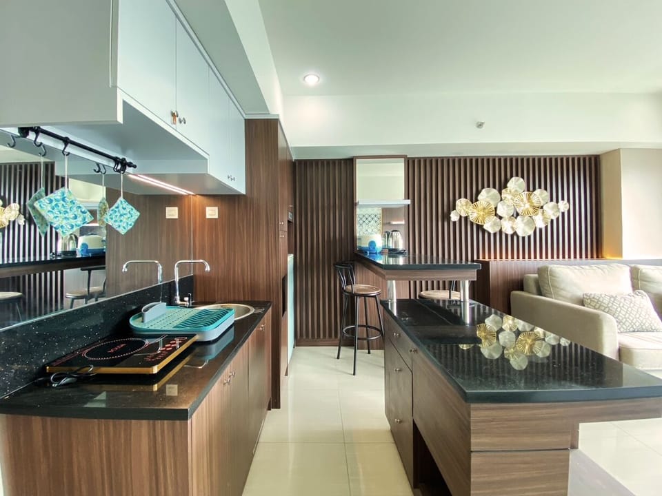 Apartment, 2 Bedrooms | Private kitchen | Fridge, stovetop, cookware/dishes/utensils, dining tables