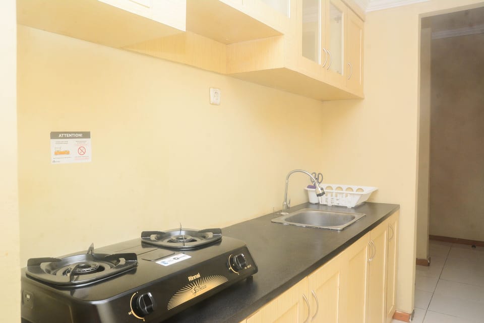 Apartment, 2 Bedrooms | Private kitchen | Fridge, stovetop, cookware/dishes/utensils, dining tables