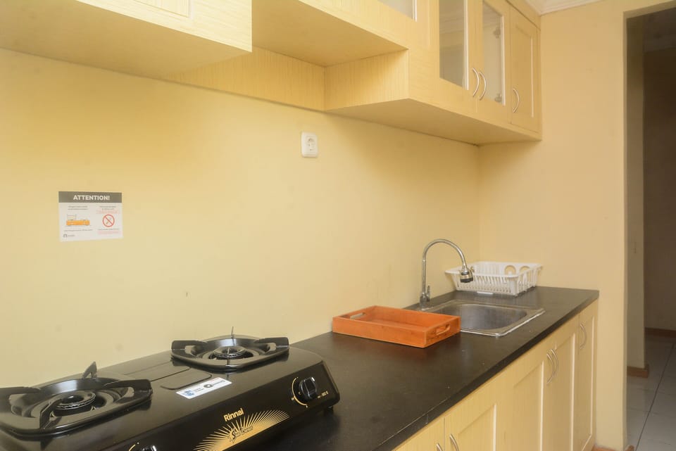 Apartment, 2 Bedrooms | Private kitchen | Fridge, stovetop, cookware/dishes/utensils, dining tables