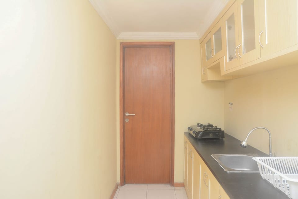 Apartment, 2 Bedrooms | Private kitchen | Fridge, stovetop, cookware/dishes/utensils, dining tables