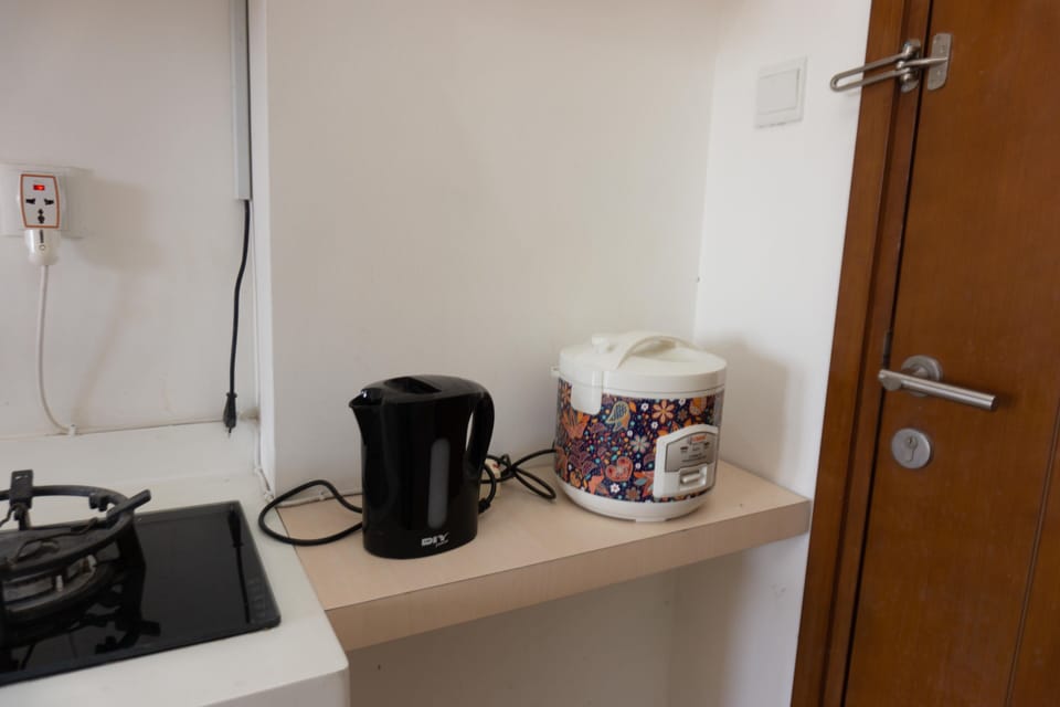 Studio | Private kitchen | Fridge, stovetop, cookware/dishes/utensils, dining tables