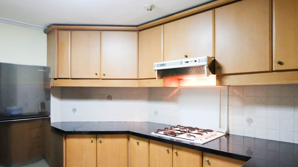 Apartment, 2 Bedrooms | Private kitchen | Fridge, stovetop, cookware/dishes/utensils, dining tables