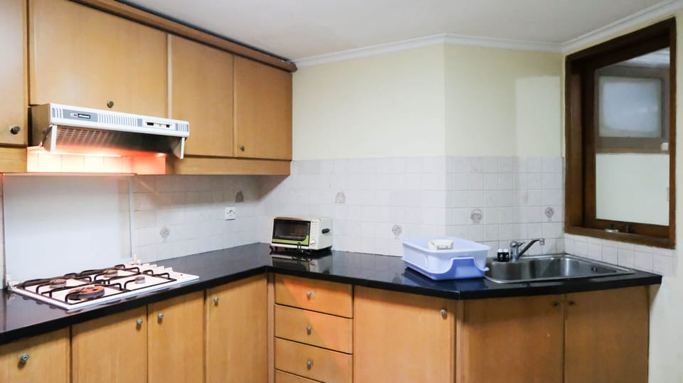 Apartment, 2 Bedrooms | Private kitchen | Fridge, stovetop, cookware/dishes/utensils, dining tables
