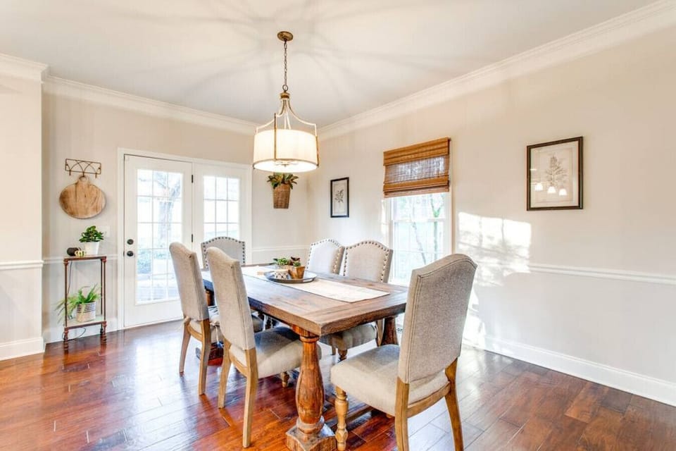 Dining area off of the living room and connected to the kitchen.