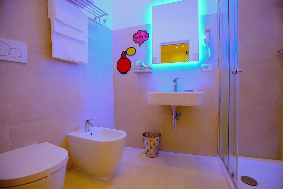 Shower, rainfall showerhead, free toiletries, hair dryer