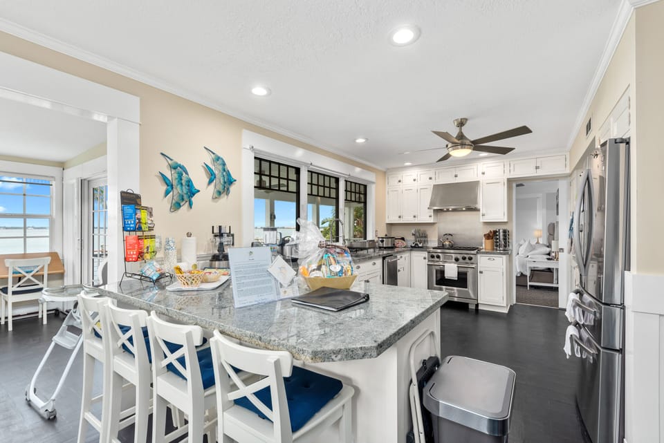 Extra seating at kitchen bar to gather or chat while you cook, prepare, or serve