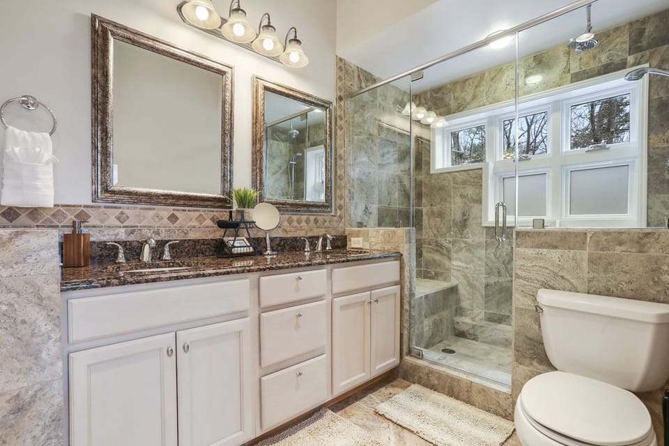 You will linger longer in the large shower, with rain shower head, hand held 