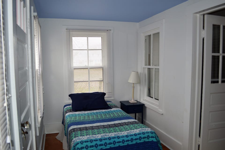 Twin Bed. Sleeping Porch located off Living Room