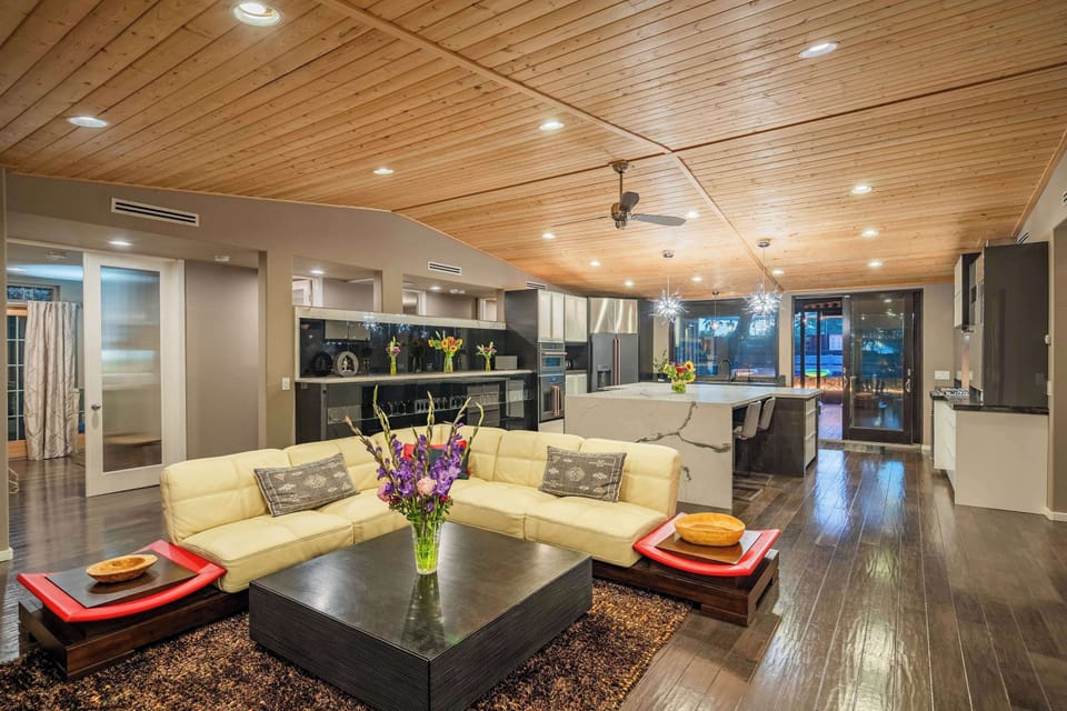 Step through the French double doors into Villa Medano, where you’re greeted by a sweeping view of the great room. This space presents custom-designed luxe furnishings and a chef’s dream kitchen, setting the tone for an extraordinary stay.